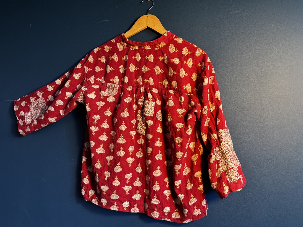 Red printed shirt with pink patches